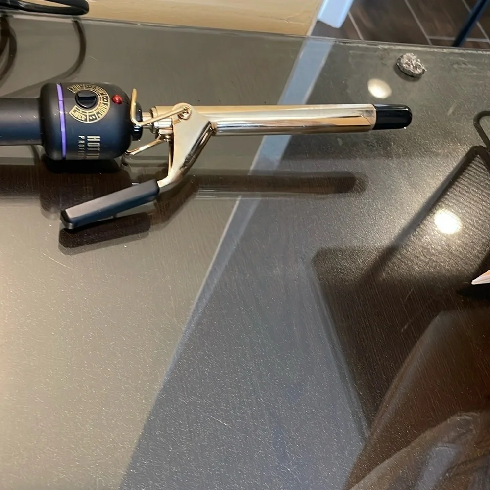 Sleek Black and Gold Curling Iron